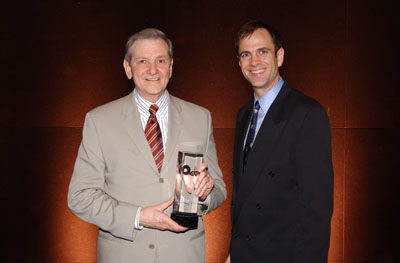 Tom receiving POY
